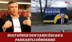 SUAT GÜNER'DEN TANJU ÖZCAN'A "PANKARTLI" GÖNDERME